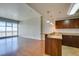 Open concept kitchen with granite countertops, stainless steel sink and city views at 150 Las Vegas Blvd # 2003, Las Vegas, NV 89101