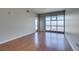 Contemporary living room with wood floors and sliding glass door offering city views at 150 Las Vegas Blvd # 2003, Las Vegas, NV 89101