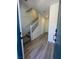 Inviting entryway with hardwood floors and staircase leading to the upper level of the home at 1533 Bat Hawk St, Las Vegas, NV 89144