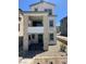 Charming two-story home with stone accents and a well-maintained, low-maintenance gravel front yard at 1533 Bat Hawk St, Las Vegas, NV 89144