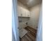 Functional laundry room with white cabinets and a utility sink, ready for appliances at 1533 Bat Hawk St, Las Vegas, NV 89144