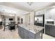 Kitchen featuring granite countertops, stainless steel appliances, and a large island at 1680 Sweet Pea Ave, Las Vegas, NV 89183