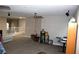 Upstairs area featuring neutral tones, a ceiling fan, and access to the downstairs area at 1680 Sweet Pea Ave, Las Vegas, NV 89183