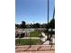 Upstairs view of tennis courts and recreation area with Las Vegas in background at 2100 Plaza Del Padre, Las Vegas, NV 89102