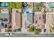 Serene aerial view of a tranquil neighborhood featuring landscaped streets and mature trees at 2104 Spanish Town Ave, North Las Vegas, NV 89031