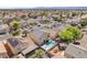 Expansive aerial view of a neighborhood with well-maintained homes and mature trees at 2104 Spanish Town Ave, North Las Vegas, NV 89031