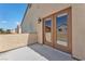 Private balcony with stucco walls and a view of neighboring homes at 2104 Spanish Town Ave, North Las Vegas, NV 89031