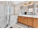 Spa-like bathroom with a soaking tub, walk-in shower, and double vanity at 2104 Spanish Town Ave, North Las Vegas, NV 89031
