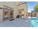 Inviting backyard pool with a covered patio, perfect for outdoor entertaining and relaxation at 2104 Spanish Town Ave, North Las Vegas, NV 89031