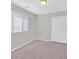 Bright bedroom with large window and closet, showcasing a clean, simple design at 2228 Sky Island Dr, Henderson, NV 89002