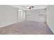 Spacious main bedroom with a large window and carpet at 2228 Sky Island Dr, Henderson, NV 89002