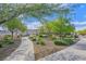 Serene community park with walking path, gazebo and mature trees creating an inviting space at 2228 Sky Island Dr, Henderson, NV 89002