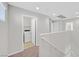 Second floor laundry room features tile floors and modern washer and dryer at 2228 Sky Island Dr, Henderson, NV 89002