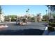 Community gate entrance showcasing well-maintained landscaping and architecture at 2325 Windmill Pkwy # 312, Henderson, NV 89074