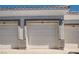 Row of garages with a modern design and clearly marked unit numbers at 2325 Windmill Pkwy # 312, Henderson, NV 89074
