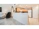Bright kitchen featuring wooden cabinets, white countertops, and stainless steel appliances at 2325 Windmill Pkwy # 312, Henderson, NV 89074