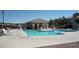 Community pool featuring a covered pavilion and mountain views with ample seating for relaxation and enjoyment at 2325 Windmill Pkwy # 312, Henderson, NV 89074