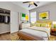 Bright bedroom featuring natural light, closet, and stylish decor at 248 Windmill Croft Dr, Las Vegas, NV 89148