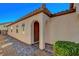 Inviting front entryway with arched columns and a decorative tiled walkway at 248 Windmill Croft Dr, Las Vegas, NV 89148