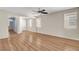 Spacious living area with wood flooring, neutral walls, and plenty of natural light at 248 Windmill Croft Dr, Las Vegas, NV 89148