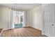 Bright room with sliding glass doors leading to a tidy backyard at 248 Windmill Croft Dr, Las Vegas, NV 89148