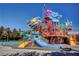 Colorful water park featuring slides, sprayers, climbing structure, and various water play elements at 248 Windmill Croft Dr, Las Vegas, NV 89148