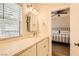 Bathroom with lots of counter space and an adjacent bedroom at 251 S Green Valley Pkwy # 1311, Henderson, NV 89012