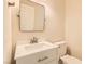 A clean bathroom with a white vanity, rectangular mirror, and modern fixtures at 251 S Green Valley Pkwy # 1311, Henderson, NV 89012