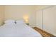 Bedroom featuring a comfortable bed and sliding closet doors, maximizing space at 251 S Green Valley Pkwy # 1311, Henderson, NV 89012