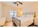 Bedroom features hardwood floors and a ceiling fan at 251 S Green Valley Pkwy # 1311, Henderson, NV 89012