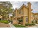 Charming two-story condo featuring a stucco exterior, red tile roof, and well-maintained landscaping at 251 S Green Valley Pkwy # 1311, Henderson, NV 89012