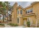 Inviting two-story condo with a stucco exterior, red tile roof, and charming front entrance at 251 S Green Valley Pkwy # 1311, Henderson, NV 89012