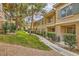 The condos offer well-manicured lawns and sidewalks shaded by mature trees at 251 S Green Valley Pkwy # 1311, Henderson, NV 89012
