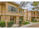 Exterior of unit highlighting the patio, windows, and well-maintained landscaping at 251 S Green Valley Pkwy # 1311, Henderson, NV 89012