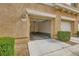 Exterior view of an open garage, showing the space and access to the home at 251 S Green Valley Pkwy # 1311, Henderson, NV 89012