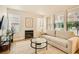 Cozy living room with a fireplace, neutral decor, and plenty of natural light at 251 S Green Valley Pkwy # 1311, Henderson, NV 89012