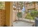 Private patio area featuring a brick pillar and view of the landscaped surroundings at 251 S Green Valley Pkwy # 1311, Henderson, NV 89012