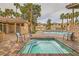 Inviting community pool and spa area with lounge chairs and lush landscaping at 251 S Green Valley Pkwy # 1311, Henderson, NV 89012