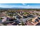 Expansive aerial view of a neighborhood with desert landscaping and stunning mountain views in the background at 2612 Dearport Ct, Henderson, NV 89052