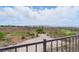 Scenic view of the backyard overlooking a sprawling desert landscape and distant mountains at 2612 Dearport Ct, Henderson, NV 89052
