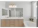 Bathroom featuring double sinks, a soaking tub, and a glass-enclosed shower at 2612 Dearport Ct, Henderson, NV 89052