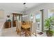 Charming dining area featuring neutral colors, natural light, and an outdoor view at 2612 Dearport Ct, Henderson, NV 89052