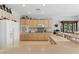 The eat-in kitchen features ample cabinet and counter space, as well as updated, white appliances at 2612 Dearport Ct, Henderson, NV 89052