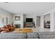 Comfortable living room features a fireplace and a decorative display shelf at 2612 Dearport Ct, Henderson, NV 89052