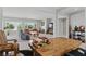 Open concept living space featuring office, entryway, living room, and natural light at 2612 Dearport Ct, Henderson, NV 89052