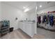 Bathroom with a spacious vanity and large walk-in closet at 2729 Pavehawk Way, Las Vegas, NV 89156