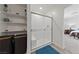 Bright bathroom featuring a glass-enclosed shower and in-set shelving, providing a spa-like atmosphere at 2729 Pavehawk Way, Las Vegas, NV 89156