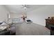 Spacious living room with fireplace, plush sofas, and open-concept kitchen at 2729 Pavehawk Way, Las Vegas, NV 89156