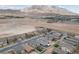 A beautiful view of the neighborhood surrounding the property, and distant mountains at 2729 Pavehawk Way, Las Vegas, NV 89156