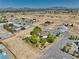 Expansive lot with mature trees featuring a single-story house in a quiet residential neighborhood at 291 E Hickory St, Pahrump, NV 89048